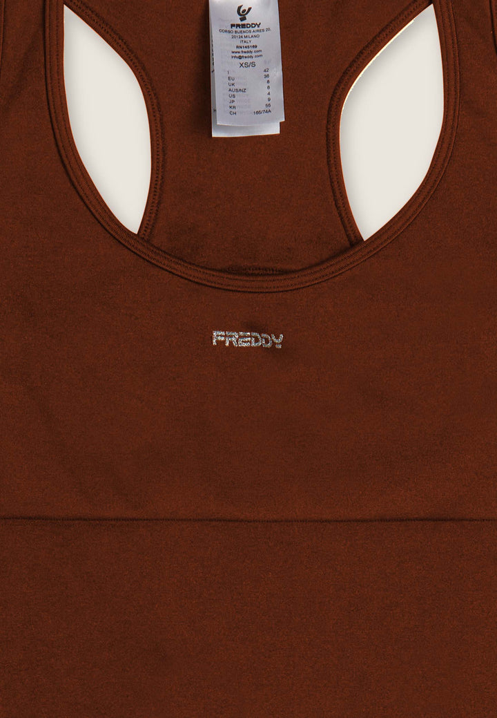 F25WSMJ1- M48  Slim Fit Jumpsuit met Racerback en Porthole Rugdetail