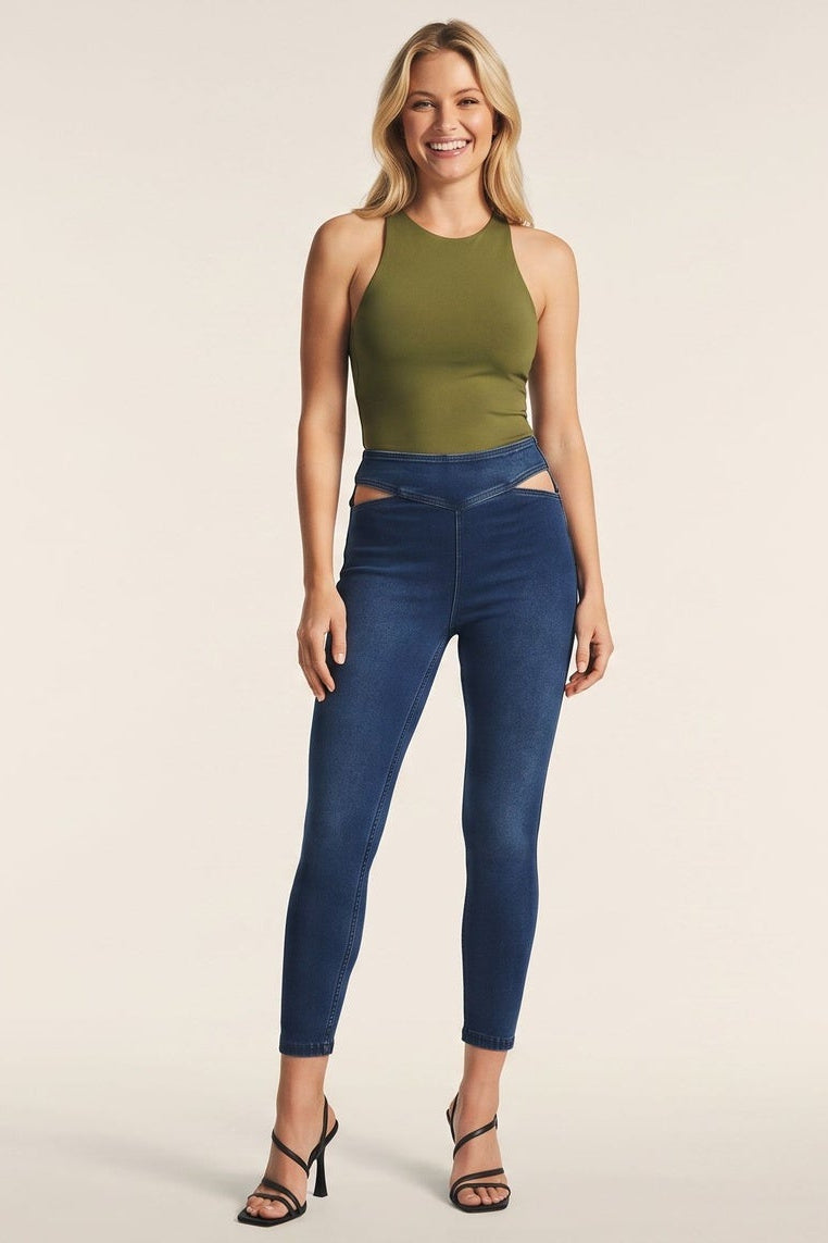 Woman wearing blue jeans and a green top, shown from front and back on a beige background