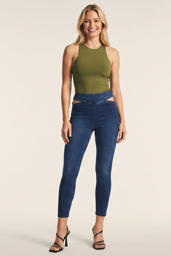 Woman wearing blue jeans and a green top, shown from front and back on a beige background