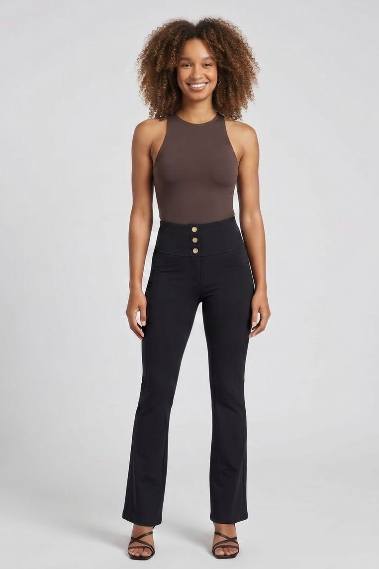 Woman wearing a brown sleeveless top and black high-waisted pants on a white background