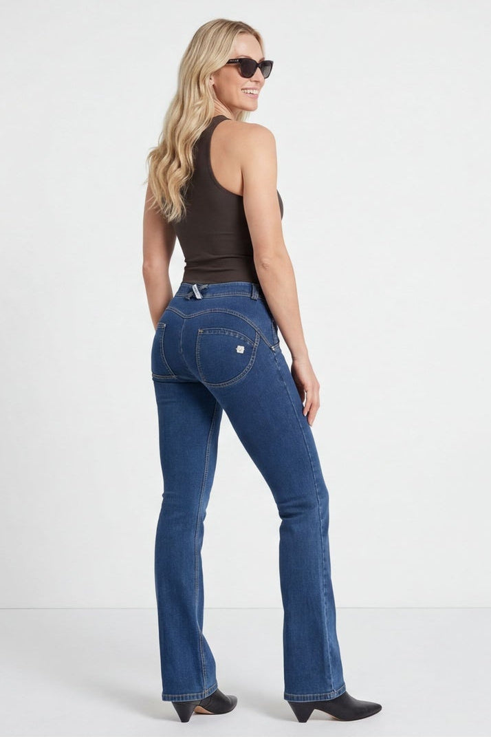 Woman wearing blue jeans shown from rear and front-side views on a white background