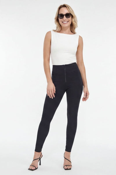Woman wearing black leggings and a white top, shown from front and side views on a white background.