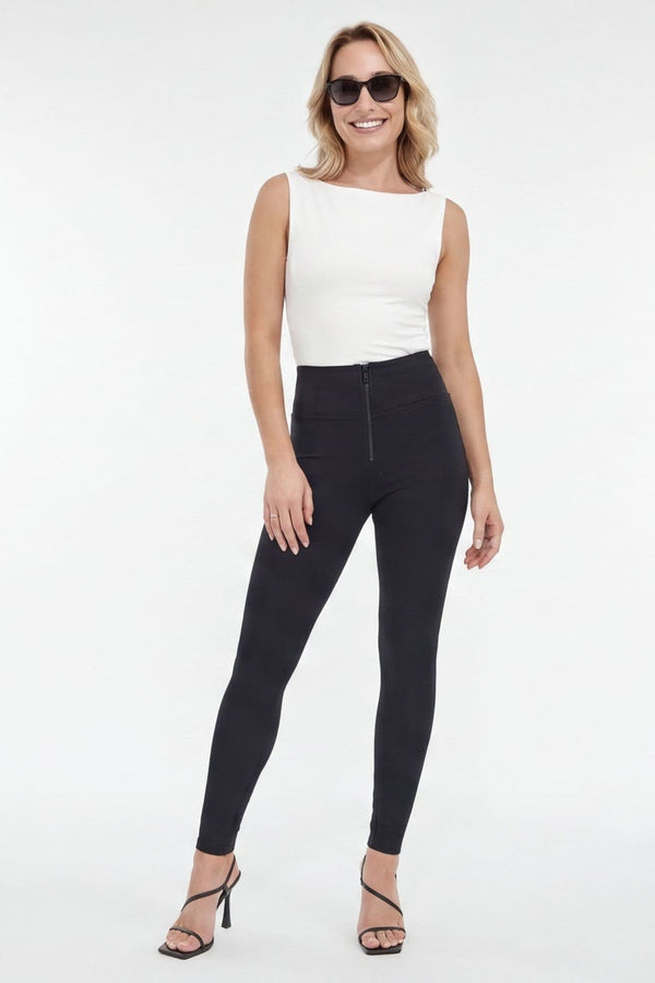 Woman wearing black leggings and a white top, shown from front and side views on a white background.