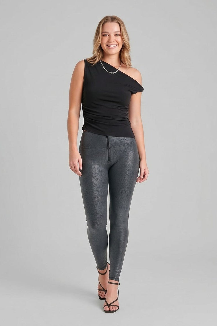 Woman wearing black top and gray leggings from different angles on a gray background