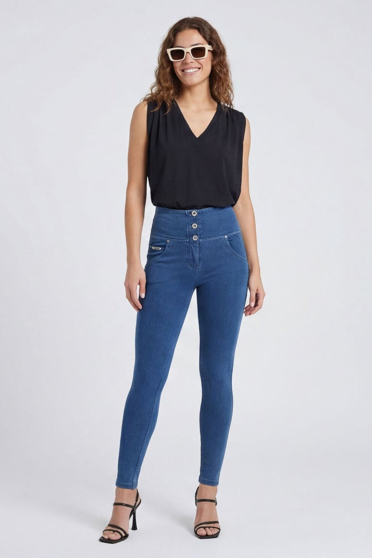 Woman wearing blue jeans and a black top, shown from front and back on a white background